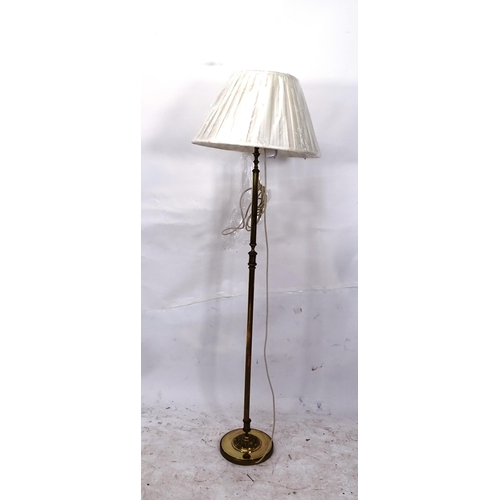 2124 - A brass standard lamp with shade, height overall 103cm