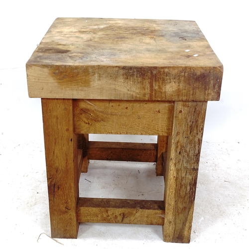 2130 - An Antique pine-topped butcher's block, W75cm, H93cm, D77cm