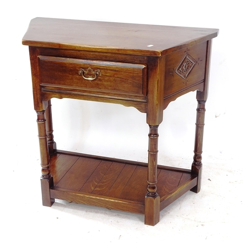 2134 - An oak 2-tier hall table of canted form, with single drawer, W85cm, H76cm, D42cm