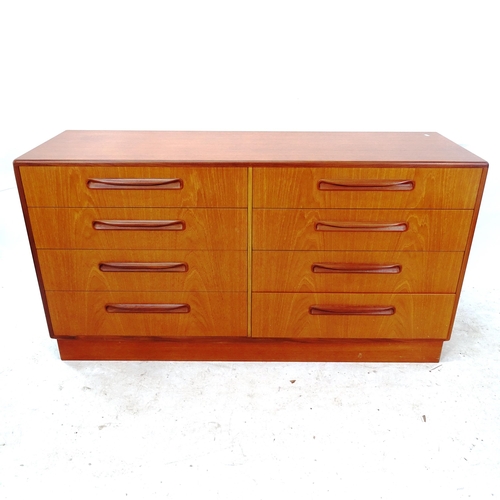 2267 - A G Plan teak side by side chest of 8 drawers, W142cm, H77cm, D45cm, with paper label for E Gomme Lt... 