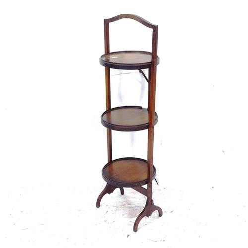 2278 - An Edwardian mahogany 3-tier folding cake stand, W28cm, H90cm