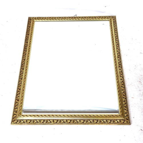 2294 - A large Georgian style bevel-edge wall mirror, with carved and pierced frame, W106cm, H137cm