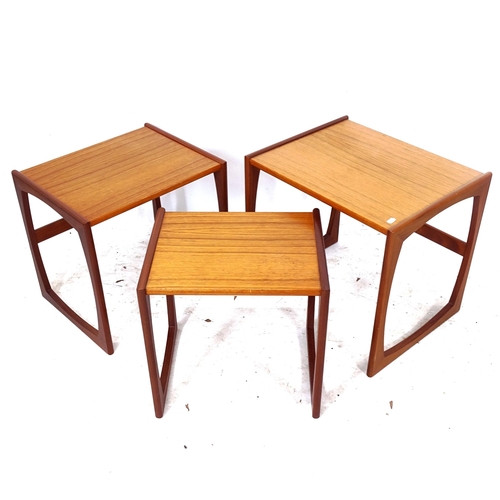 2302 - A mid-century nest of 3 teak rectangular occasional tables, largest W54cm, H49cm, D43cm