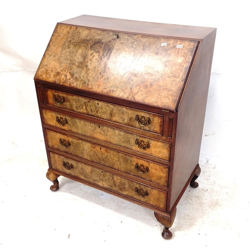 2331 - A reproduction mahogany and burr-walnut veneered bureau, with fitted interior, and 4 long drawers be... 