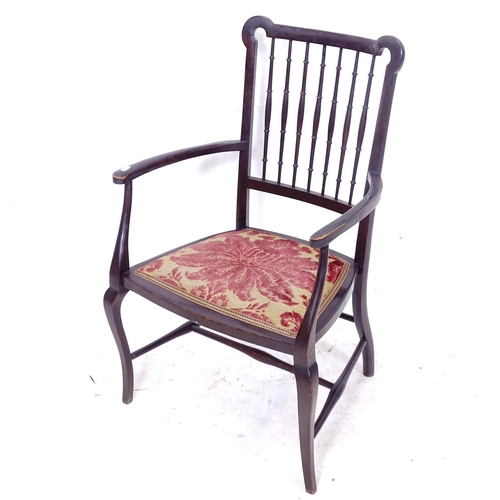 2334 - An ebonised parlour armchair, with upholstered seat and bobbin turned back