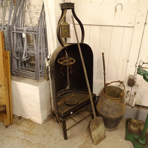 2728 - An Antique clockwork oven, an iron bucket, peel etc