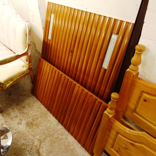 2738 - A 1950s teak single bed with rails, the headboard having inset fitted lights