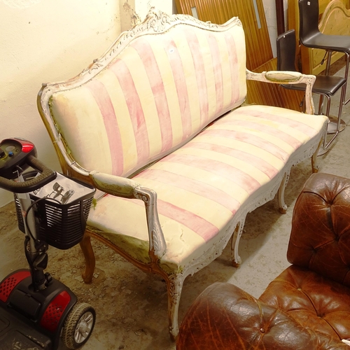 2740 - A painted and gilded French salon settee, L183cm