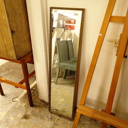 2745 - A rectangular gilt-framed wall mirror