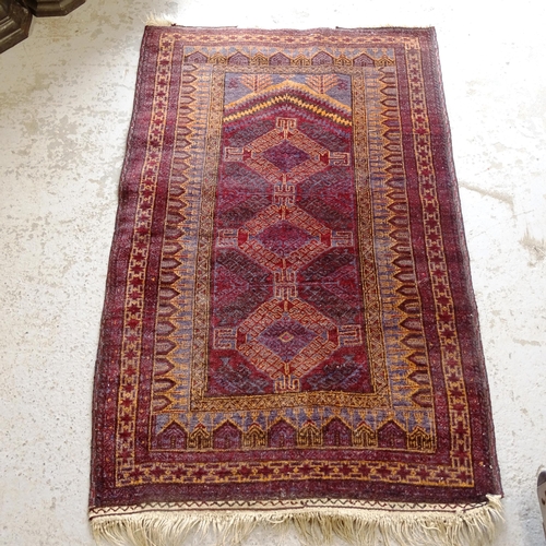 2748 - A red ground Belouchi rug, 153cm x 95cm