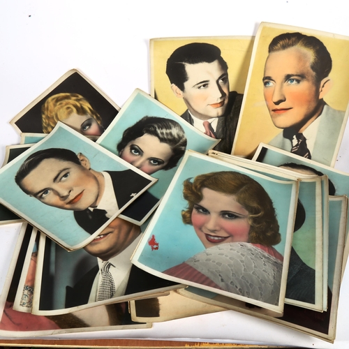 792 - Vintage coloured photographic prints of 1930s/40s  film stars, and book 