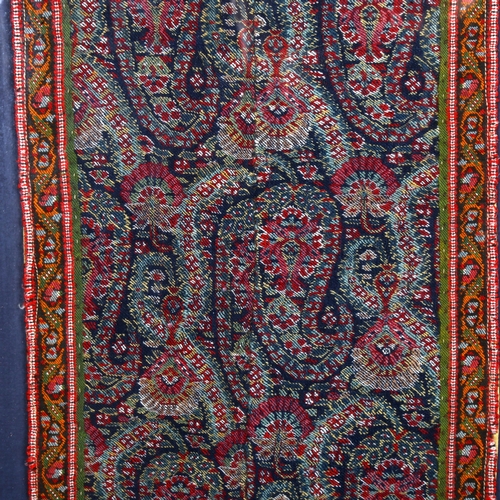 805 - A framed embroidered paisley panel, overall 77cm x 40cm