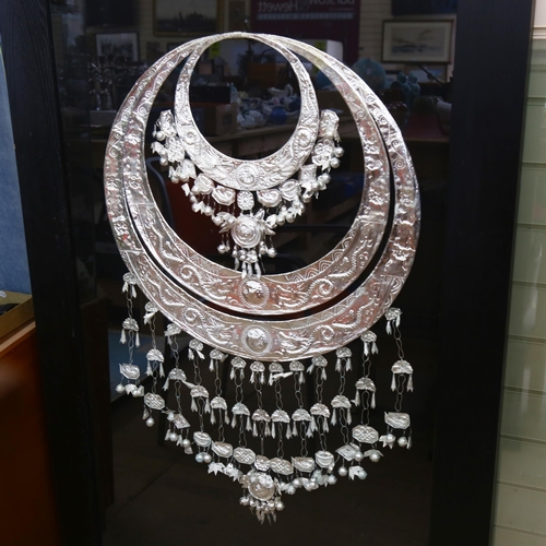 807 - A large framed and glazed Chinese Miao necklace, overall 142cm x 89cm