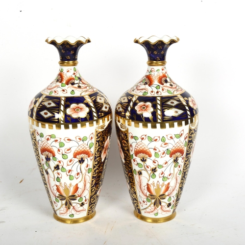 810 - A pair or Royal Crown Derby Imari style vases, with painted and gilded decoration, height 23cm