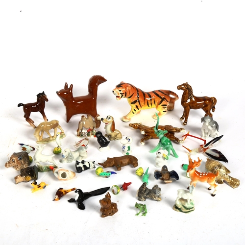 815 - Wade Whimsie porcelain figures, and Venetian glass animals