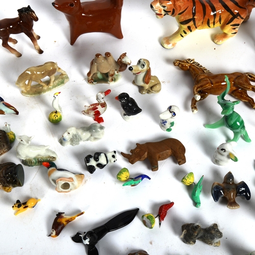 815 - Wade Whimsie porcelain figures, and Venetian glass animals