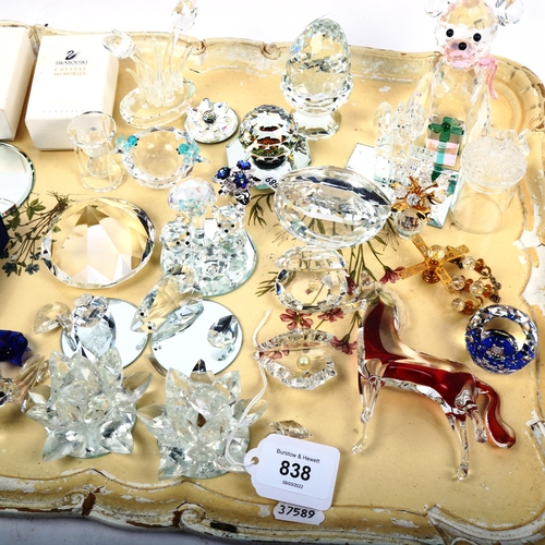 838 - A quantity of Swarovski Crystal glass ornaments and figures