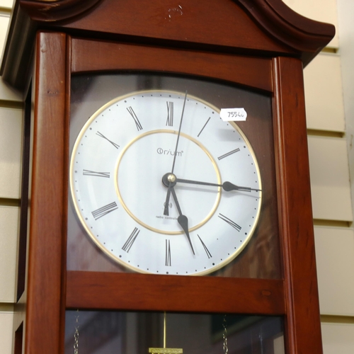 853 - An Orium Antique style quartz wall clock, 80cm