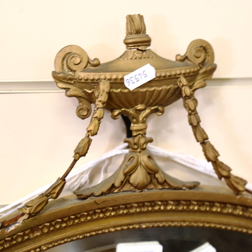 867 - A Neo-Classical style gilt-framed ribbon swag oval wall mirror, height 56cm, width 55cm