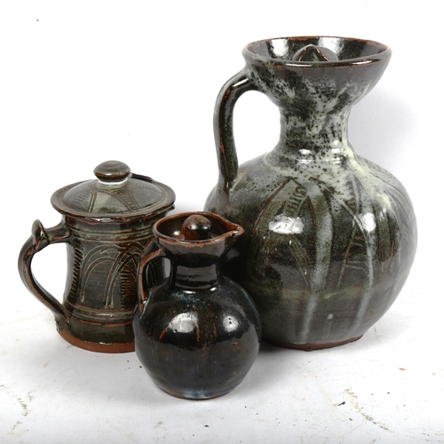 882 - 3 Abuja pottery jugs, largest height 25cm