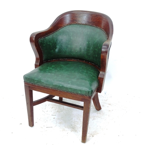 2138 - An early 20th century oak Globe-Wernicke desk chair, with studded upholstered seat, and maker's bras... 