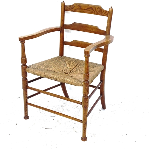 2142 - A Morris & Company Arts and Crafts ladder-back chair, with rush seat, in the Cotswold manner, circa ... 