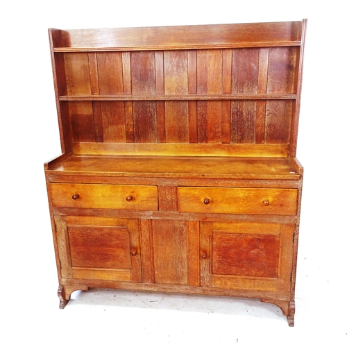 2146 - A Heals Cotswold School Arts and Crafts oak dresser, by Greening of Oxford, circa 1930, W132cm, H156... 