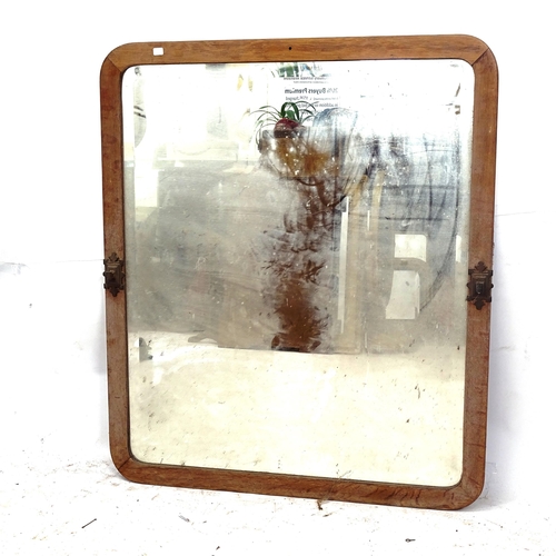 2154 - An oak-framed bevel-edge wall mirror, with brass sconce mounts, W90cm, H105cm