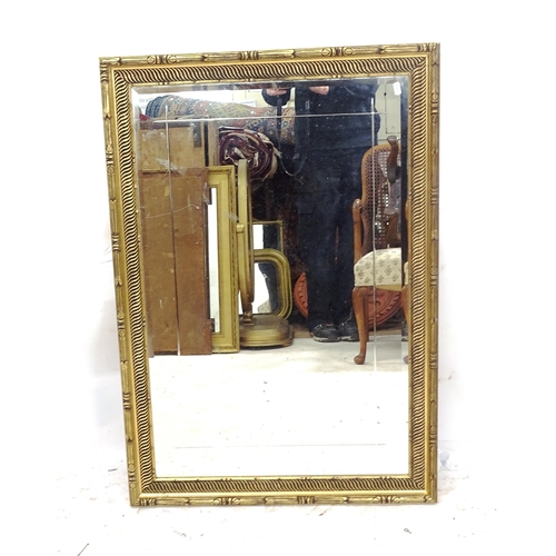 2155 - A modern gilt-framed bevel-edge wall mirror, 70cm x 100cm