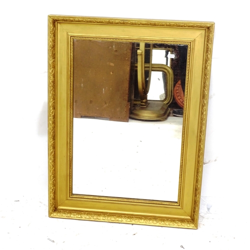 2156 - A gilt-framed rectangular wall mirror, with embossed decoration, W60cm, H80cm