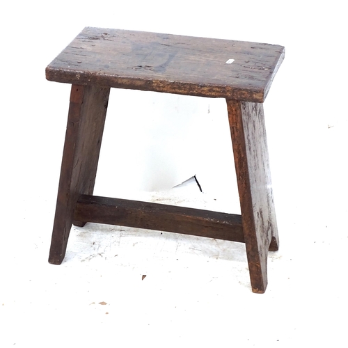 2252 - An 18th century oak stool of plain form