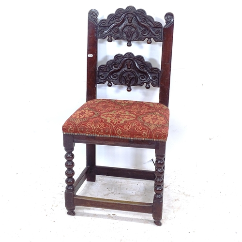 2260 - An 18th carved oak hall chair with upholstered seat