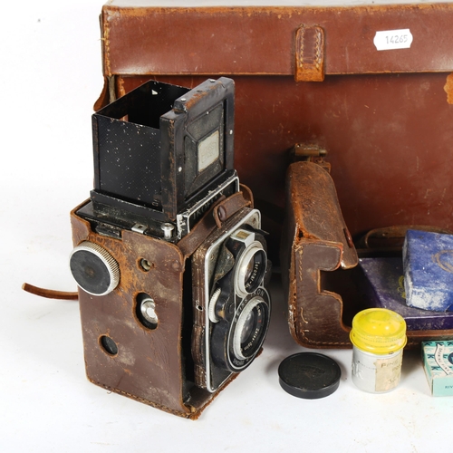 72 - ZEISS IKON - a Vintage Ikoflex twin lens camera, in leather case