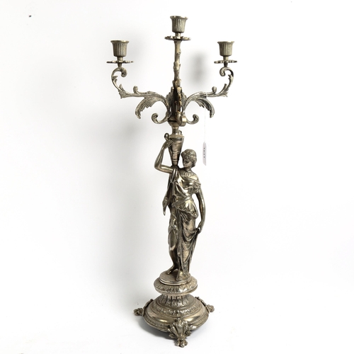 1011 - A silver plate on copper table candelabra, with figural column support, height 58cm