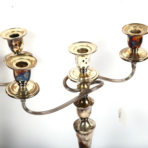 1019 - A pair of silver plated 2-branch table candelabras