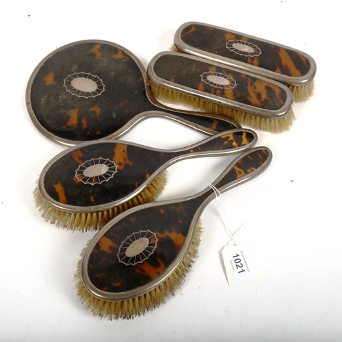 1021 - An early 20th century silver and mother-of-pearl 5-piece dressing table brush and mirror set, maker'... 