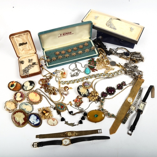 1033 - A quantity of mixed costume jewellery, to include cameos, wristwatches, gilt-metal and other jewelle... 