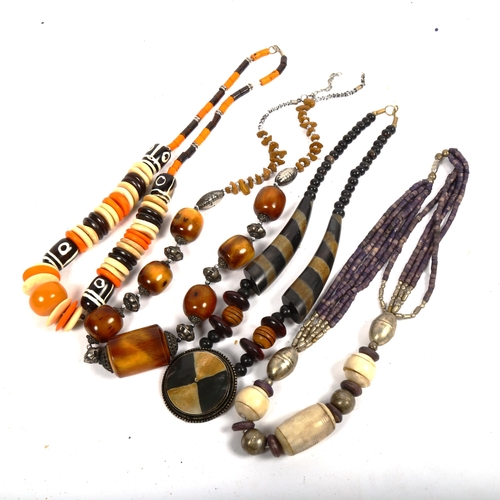 1039 - 4 Ethnic design bead necklaces