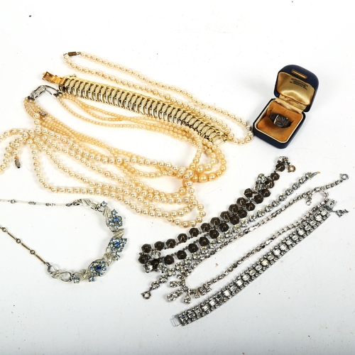 1040 - Costume pearl necklaces, a silver ring etc