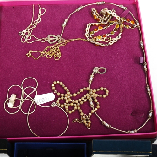 1041 - A quantity of mixed costume jewellery, to include boxed Swarovski, necklaces, pendants, rings etc, i... 