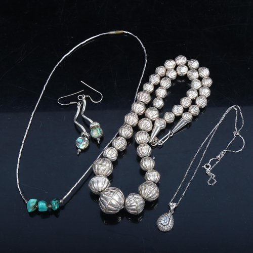 1065 - A silver and crystal set necklace, a silver bead shape necklace etc