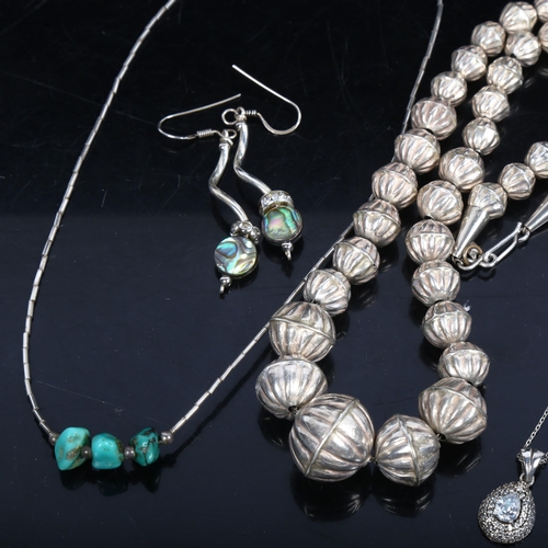 1065 - A silver and crystal set necklace, a silver bead shape necklace etc