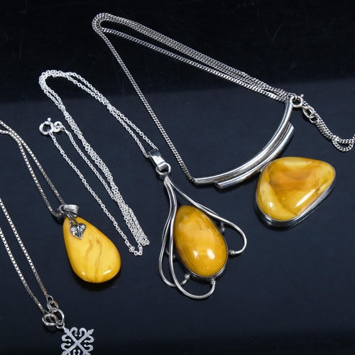 1070 - 3 silver and custard coloured amber pendant necklaces