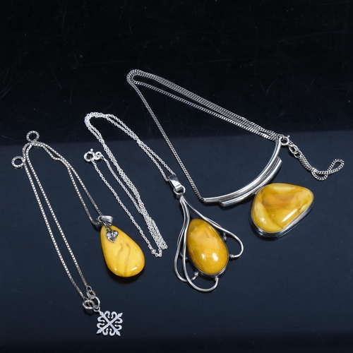 1070 - 3 silver and custard coloured amber pendant necklaces