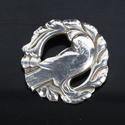 1088 - GEORG JENSEN and WENDLE A/S - a sterling silver dove brooch, model no. 123, width 47.3mm