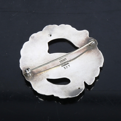 1088 - GEORG JENSEN and WENDLE A/S - a sterling silver dove brooch, model no. 123, width 47.3mm