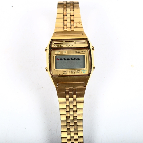 1091 - A gent's gold plated Seiko quartz digital wristwatch, boxed