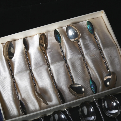 1100 - 2 sets of silver teaspoons, silver sugar tongs etc