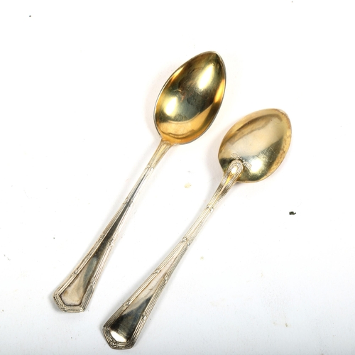 1107 - 11 Continental silver coffee spoons with gilded bowls, stamped 800, 3.7oz