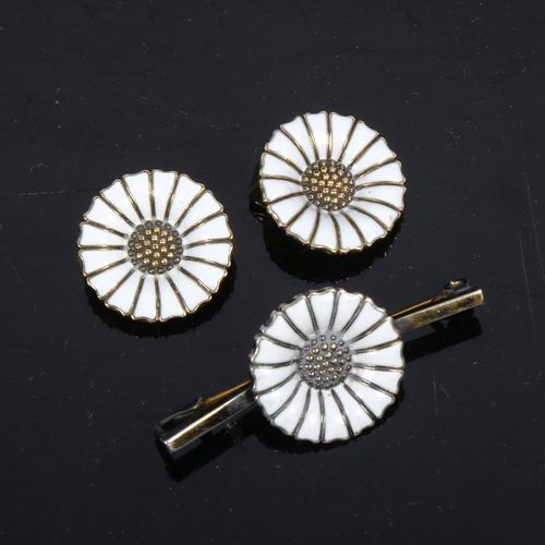 1112 - ANTON MICHELSEN - a pair of silver-gilt and white enamel daisy pattern earrings, and matching brooch